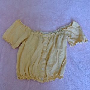 yellow off-the-shoulder button top